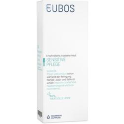 Eine weiße Verpackung für ein Duschöl für empfindliche und trockene Haut.